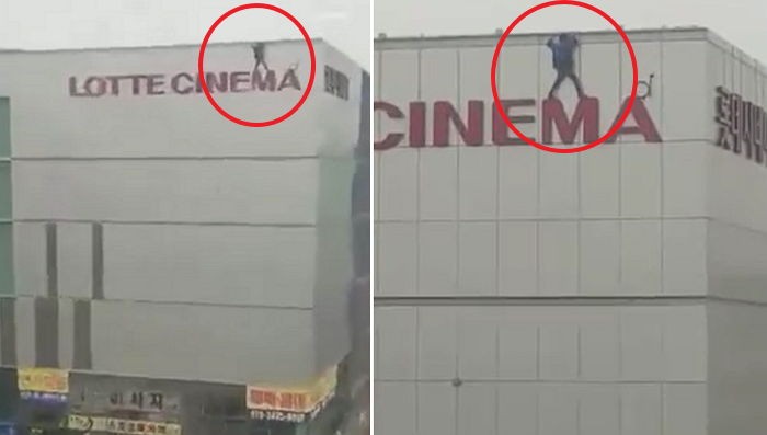 고층건물 간판 위에 올라가 자살소동 벌인 남성