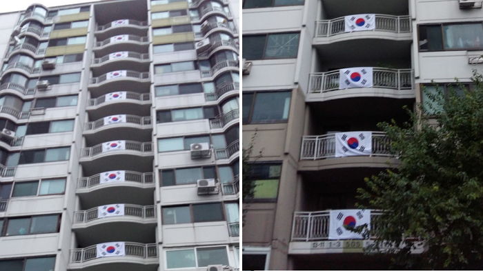 제헌절 맞이해 아파트 경비 아저씨가 내걸은 태극기