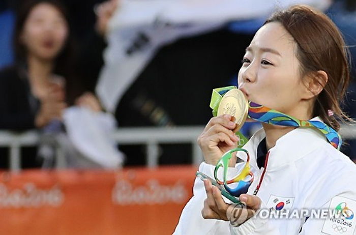 올림픽 첫 2관왕 차지한 장혜진이 ‘늦깎이 궁사’인 이유