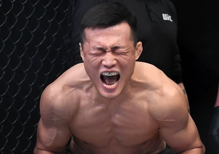 UFC 전 챔피언 때려 눕힌 ‘코리안좀비’ 정찬성 앞니에 선명히 박힌 ‘태극기’