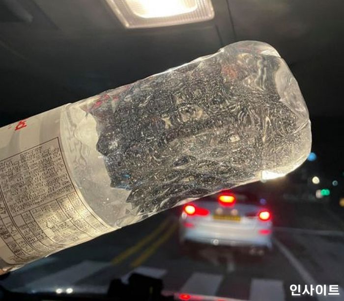 “부유물 떠다니는 롯데마트 생수 마시고 복통에 시달렸습니다”