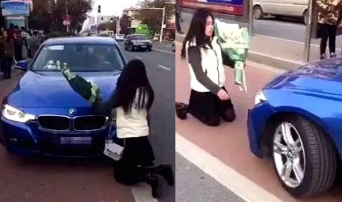 “돈 때문에 만나는 거 아냐”라고 외치며 이별 통보한 남친 BMW 앞에 무릎 꿇은 여성