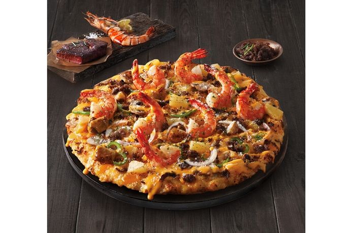누적 판매 1000만 판 돌파한 도미노피자의 ‘블랙타이거 슈림프 피자’