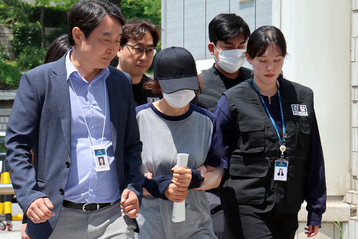origin_‘대리투표’선거사무원영장심사출석.jpg