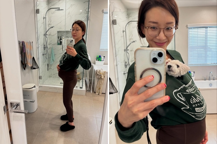 “애가 뱃속에 있으면 이런 느낌?”... 이아현, 반려견 옷 속에 쏙 넣고 선보인 사진