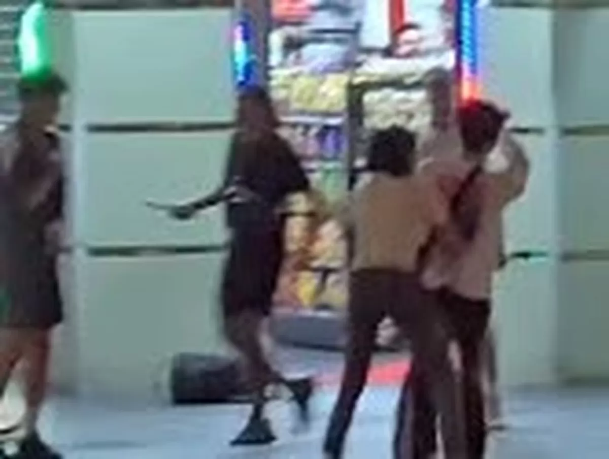 One of the alleged attackers can be seen brandishing a hammer. Picture: Instagram