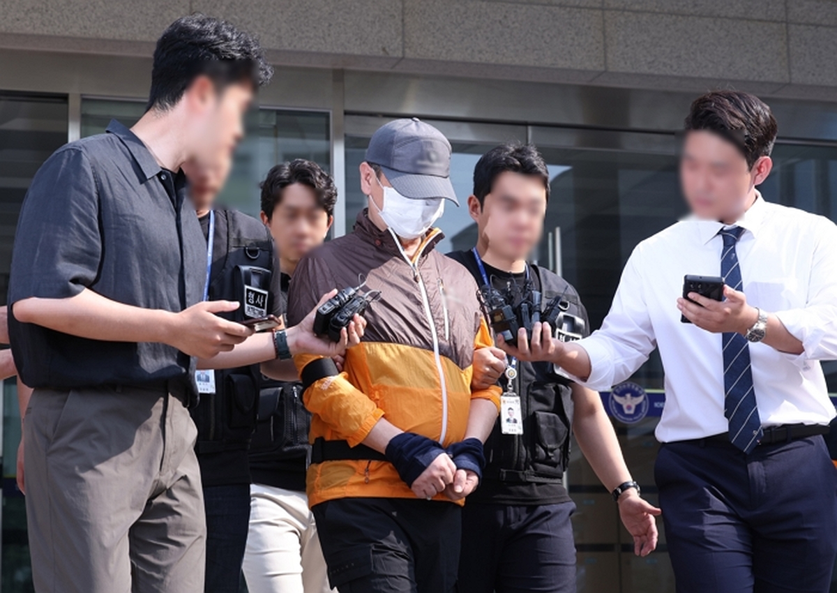 origin_총기아들살해60대얼굴가린채검찰송치.jpg