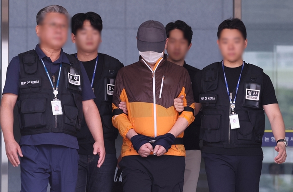 origin_총으로아들죽인아버지검찰에구속송치.jpg