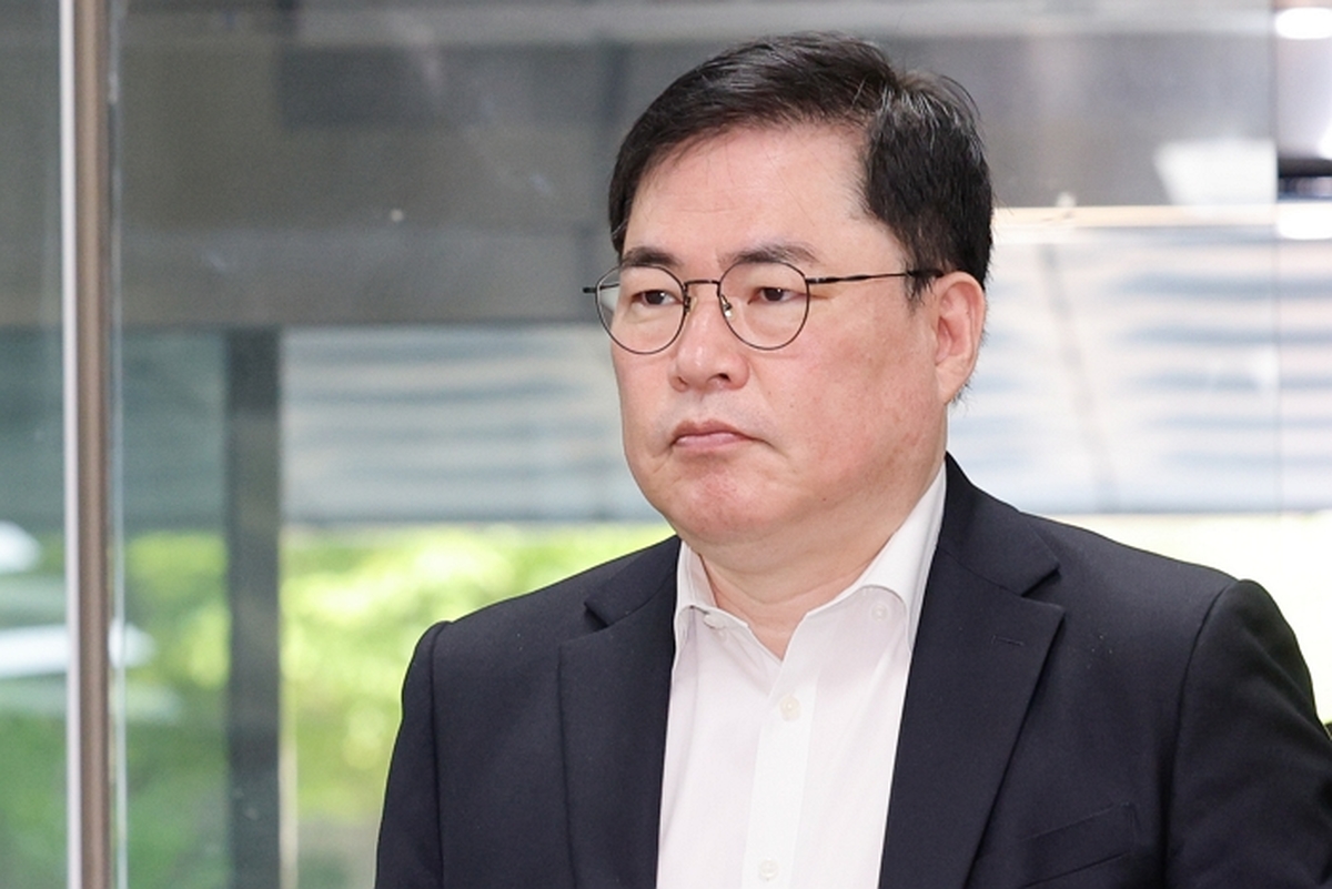 origin_법정향하는유동규.jpg