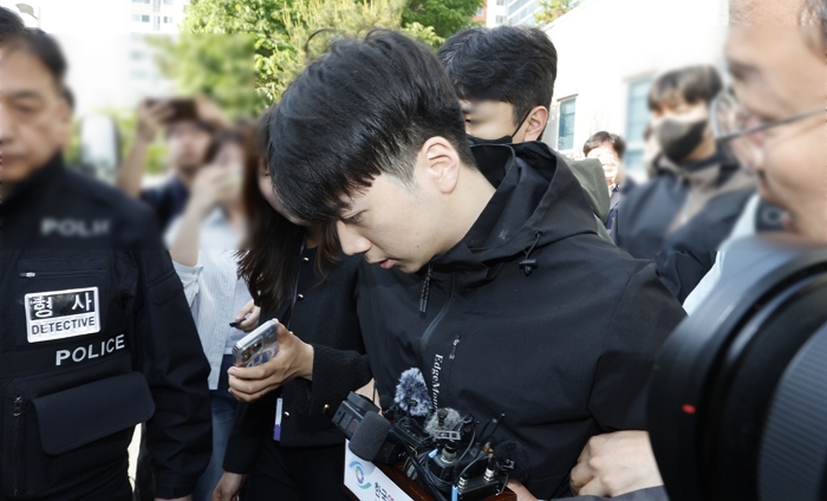 origin_호송차타는장윤기.jpg