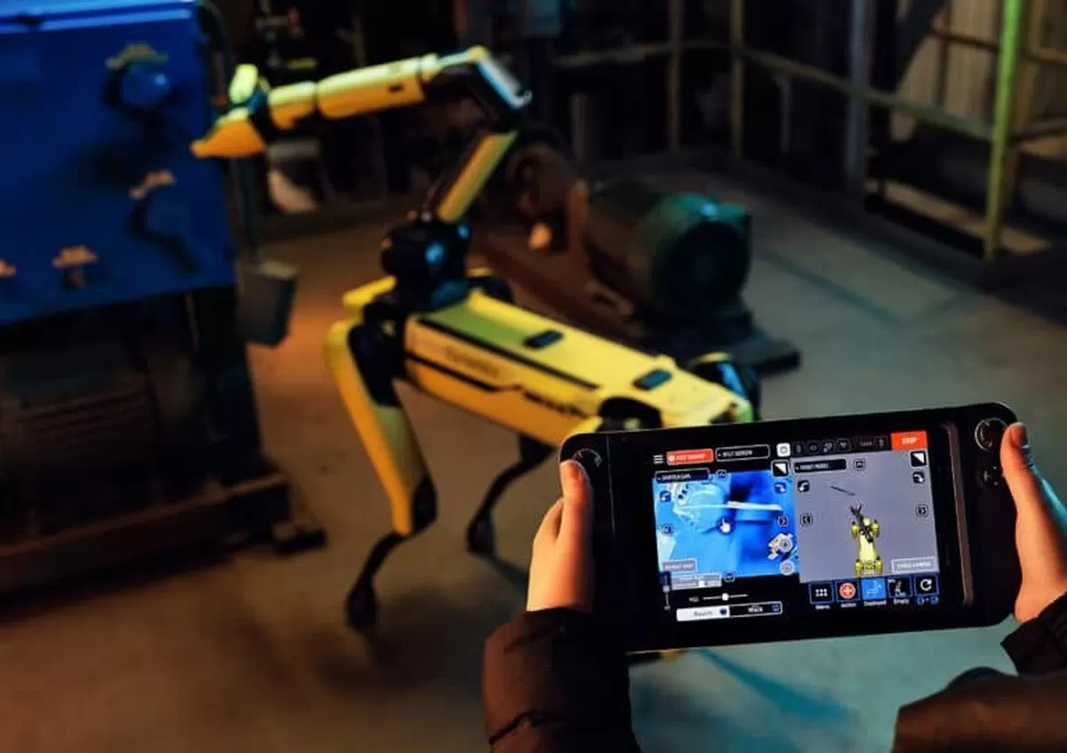 An over-the-shoulder view of the Spot tablet shows Spots semi-autonomous manipulation capabilities