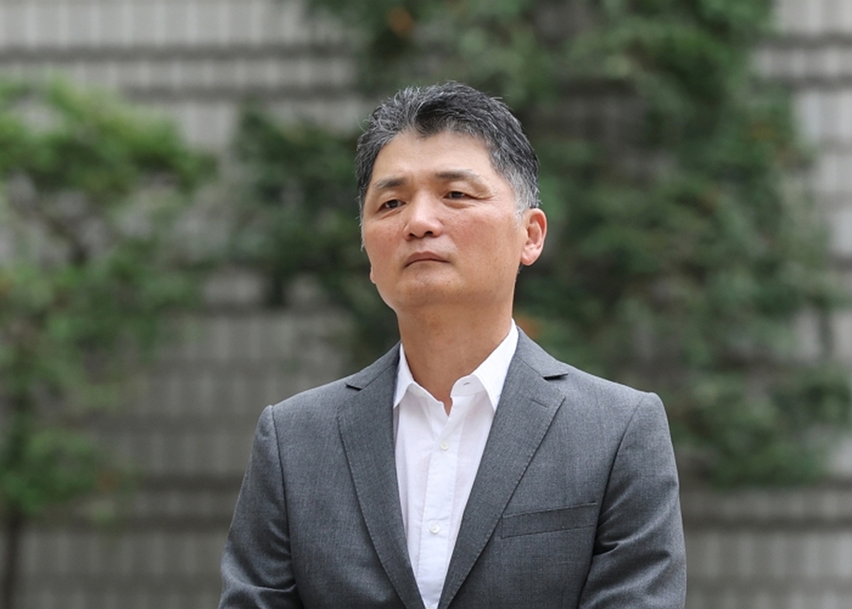 origin_법정향하는김범수미래이니셔티브센터장.jpg
