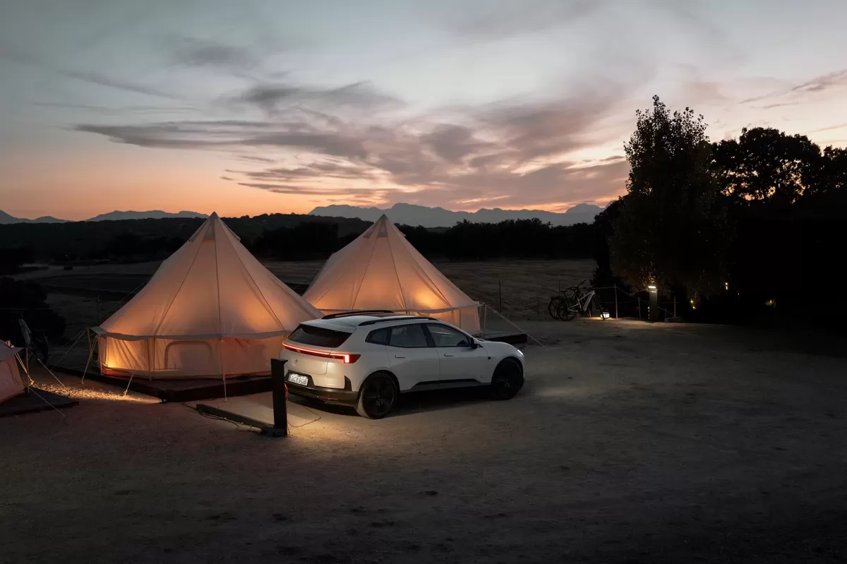 Polestar 4 SUV charging camping site with V2L